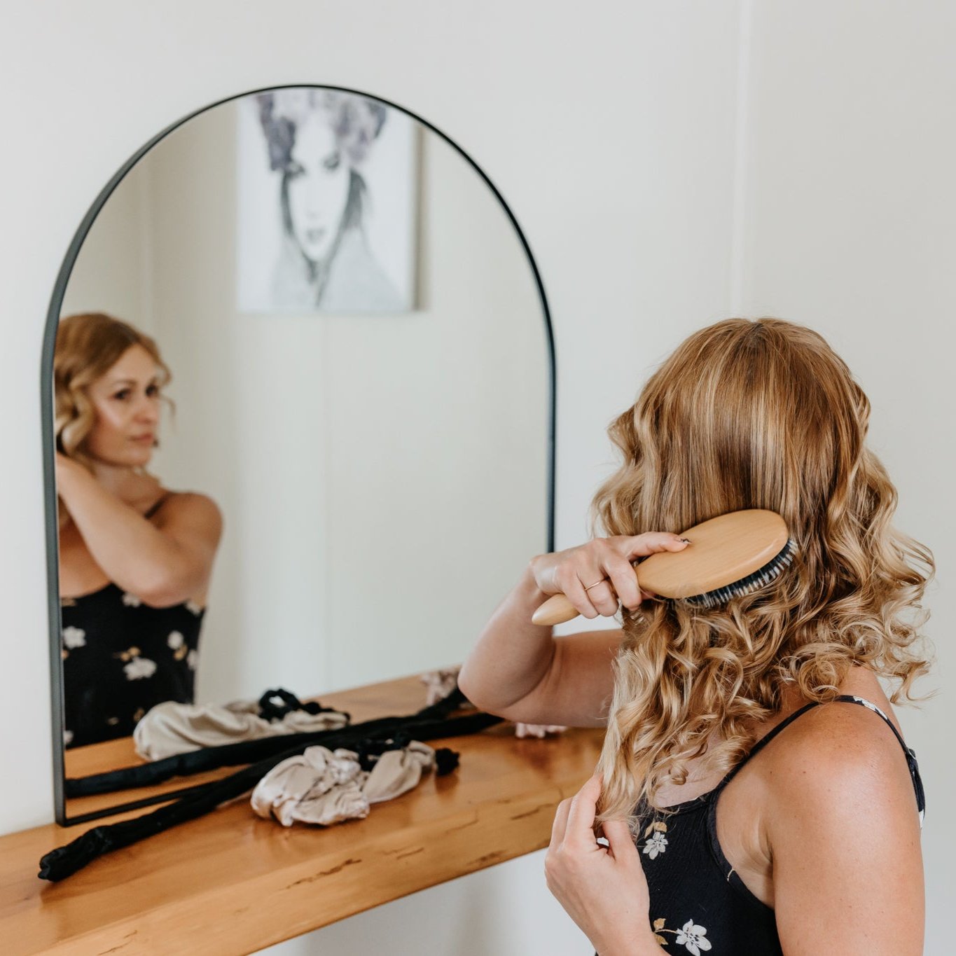 Use our boar bristle brush to smooth out your curls to waves